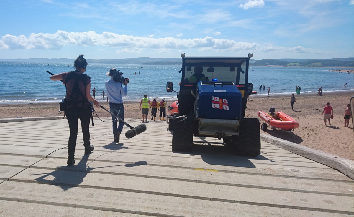 Exmouth RNLI volunteers launch on service during fundraising performance and TV filming