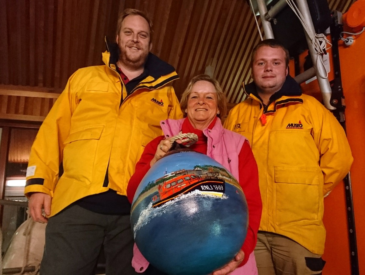 Local artist, Margot paints buoy for Exmouth lifeboat station