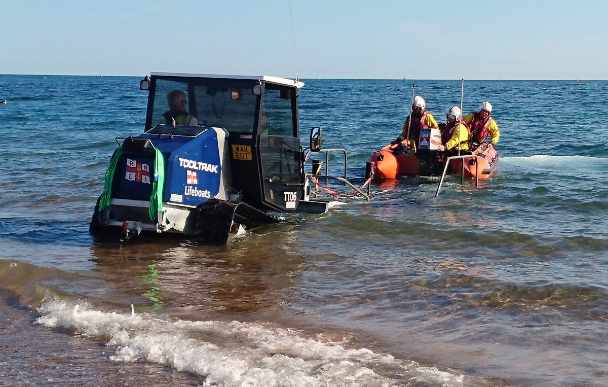 Exmouth RNLI volunteers rescue four teenagers cut off by the tide