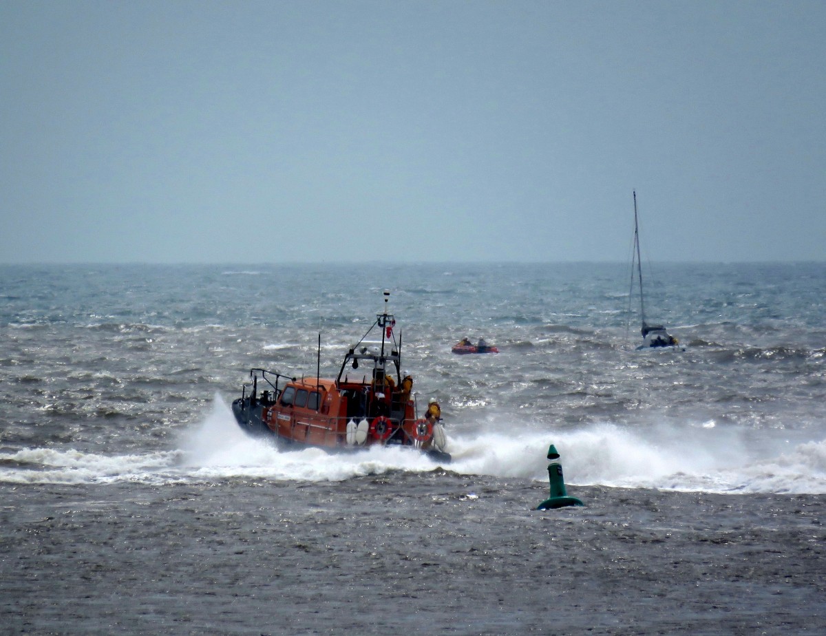 Both Exmouth lifeboats assist two people on yacht in difficulty